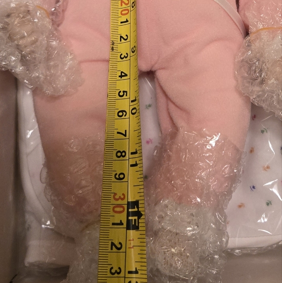 Pretty porcelain doll with certificate of authenticity. Never taken out of box. - Picture 7 of 14